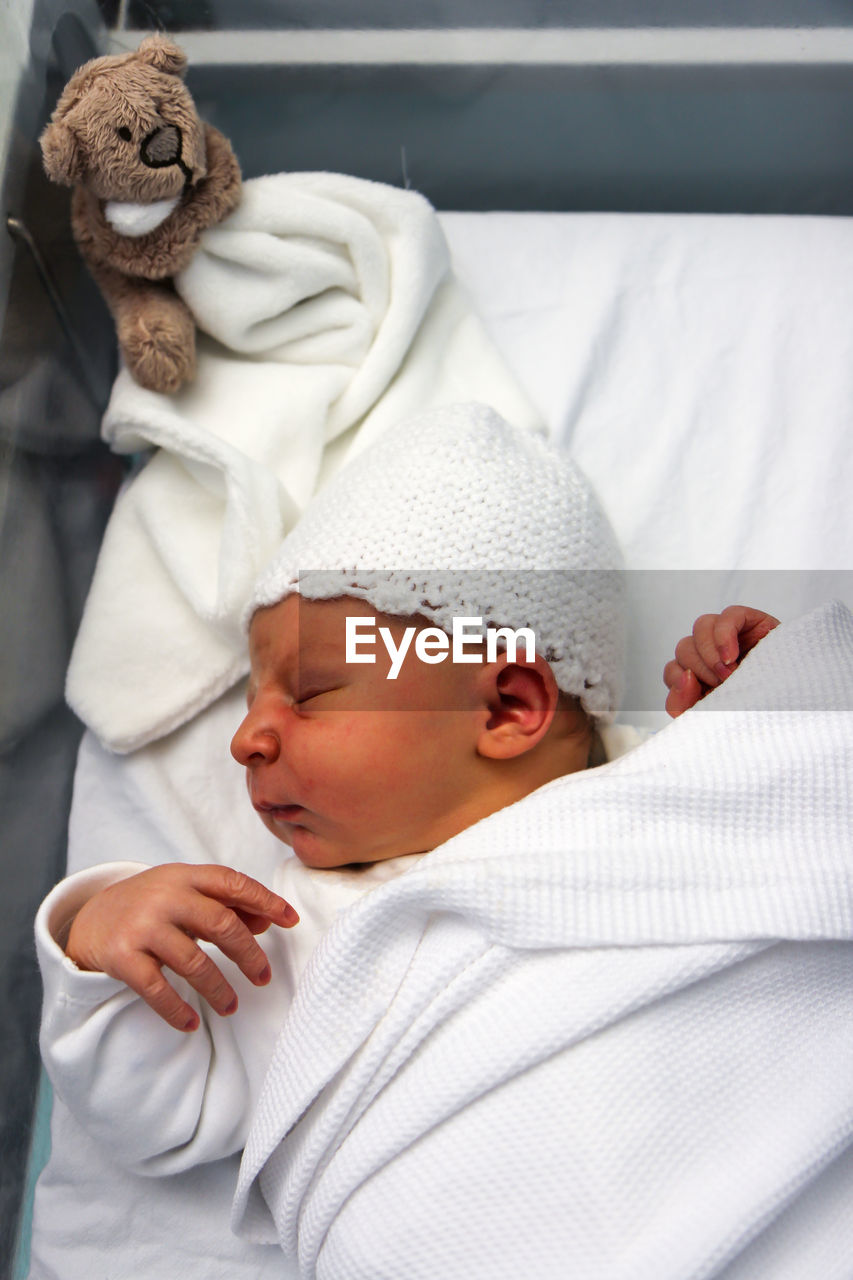 Close-up of baby boy sleeping at home