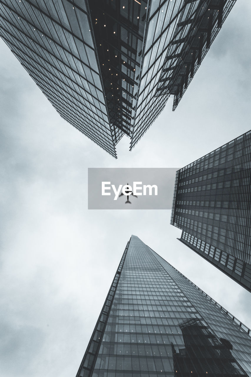 Low angle view of modern buildings against sky