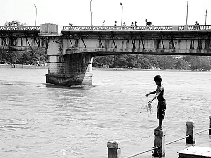 VIEW OF BRIDGE OVER RIVER