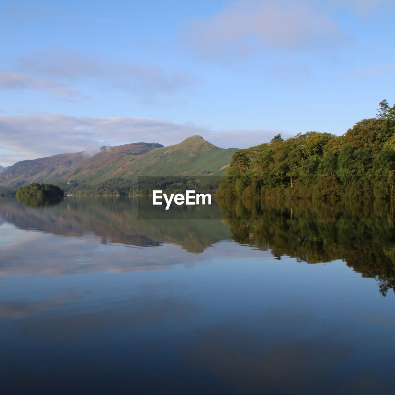 Scenic shot of calm countryside lake