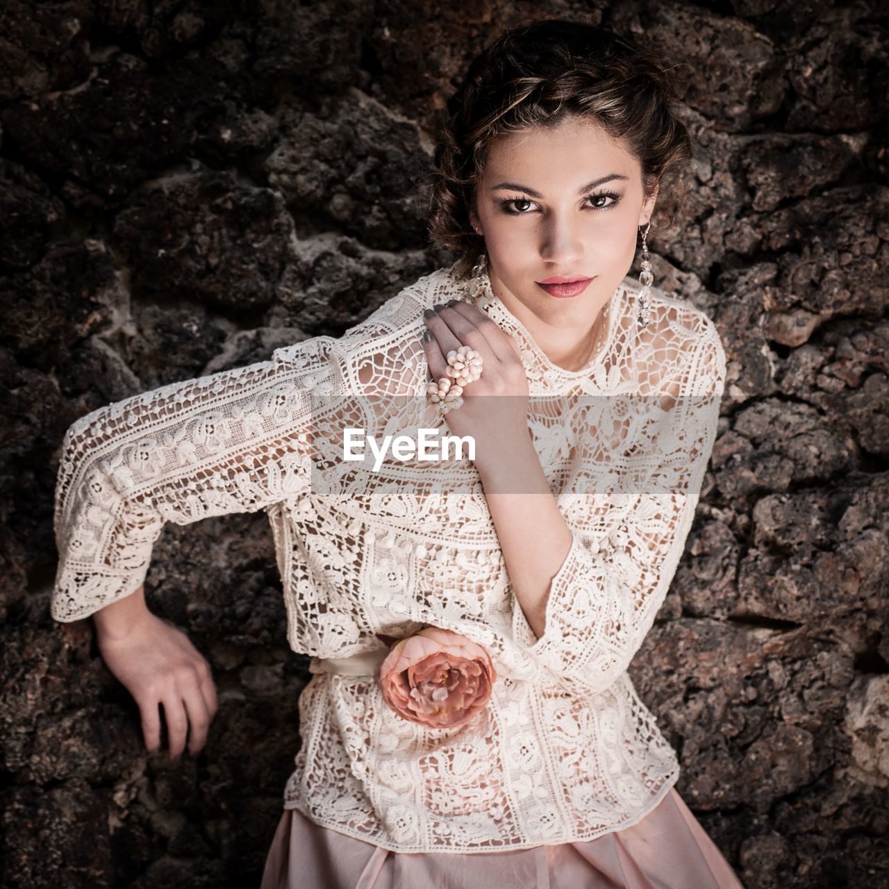 PORTRAIT OF A BEAUTIFUL YOUNG WOMAN WEARING MASK