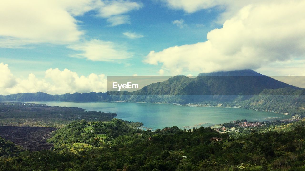 View of lake against cloudy sky