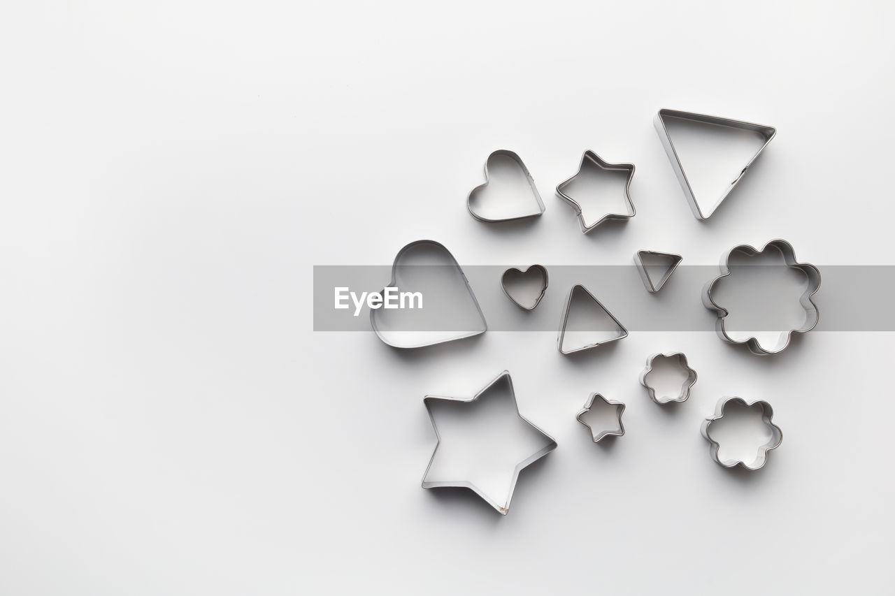 HIGH ANGLE VIEW OF ART ON WHITE BACKGROUND