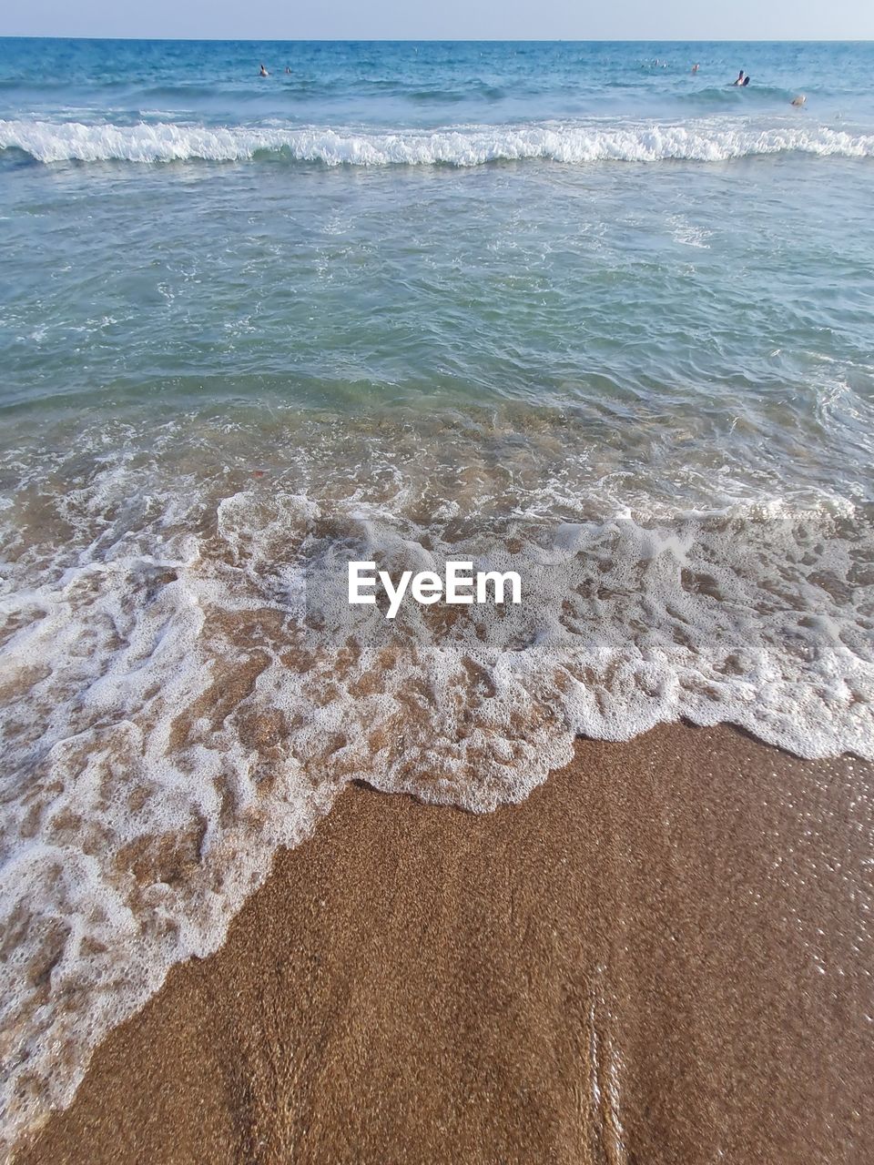 VIEW OF WAVES ON BEACH