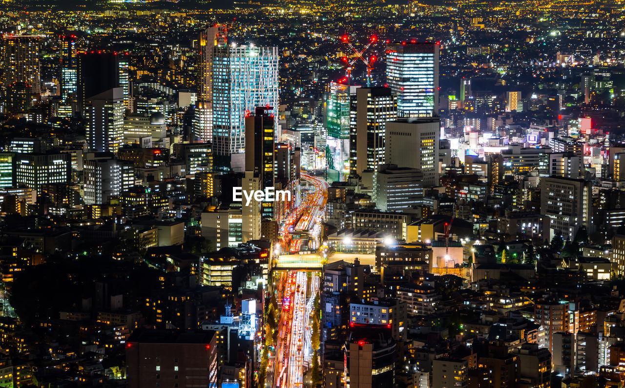 High angle view of illuminated cityscape at night