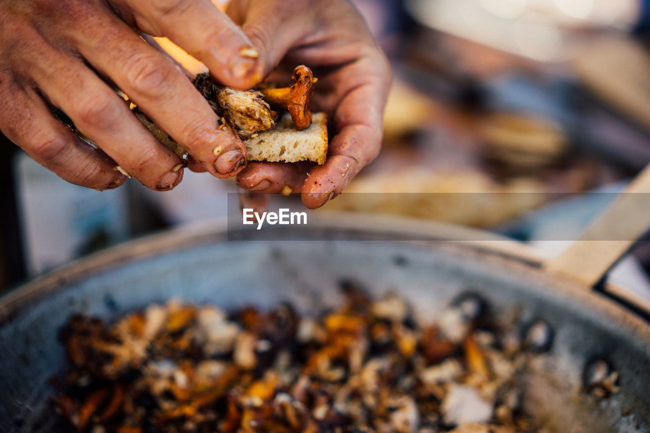 Close-up of person preparing food