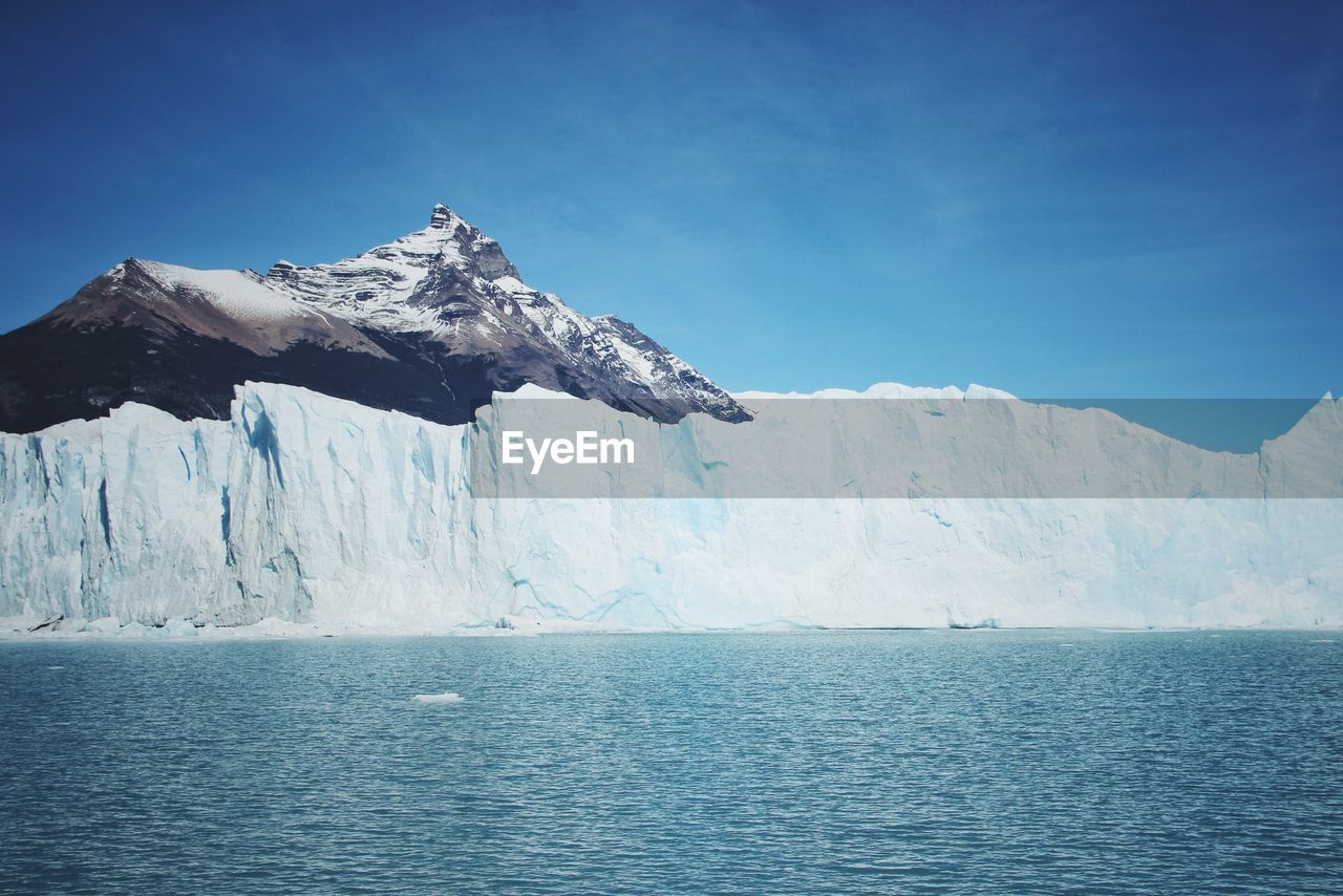 Scenic view of snowcapped mountain against sky