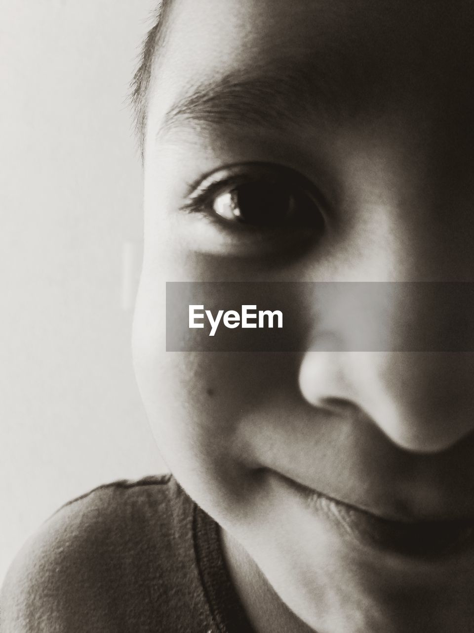 CLOSE-UP PORTRAIT OF BOY WITH EYES