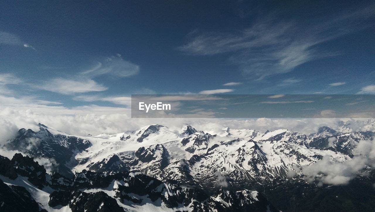 Majestic view of snowcapped swiss alps against sky