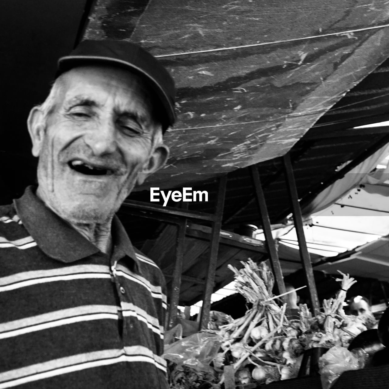 portrait, one person, adult, black and white, men, black, monochrome, looking at camera, white, monochrome photography, person, smiling, mature adult, hat, emotion, happiness, senior adult, nature, headshot, lifestyles, plant, architecture, front view, clothing, day, casual clothing