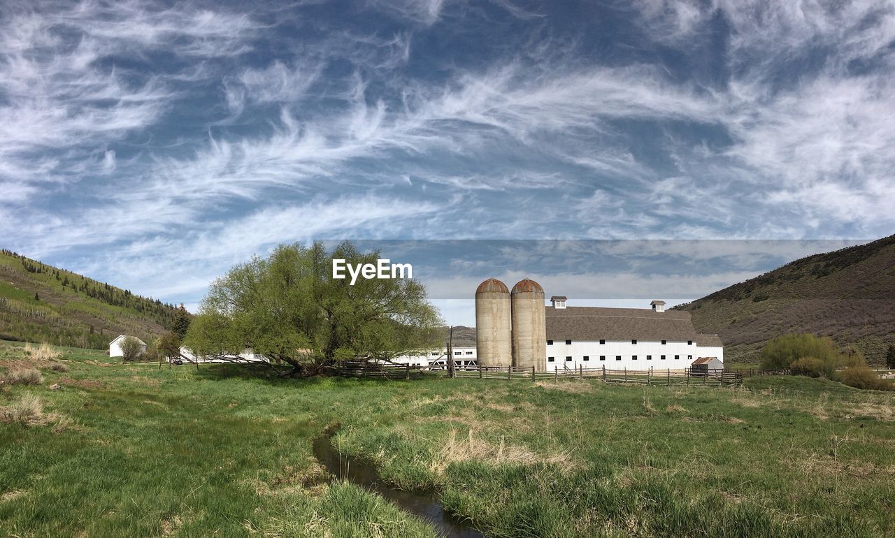 View of castle on landscape against sky