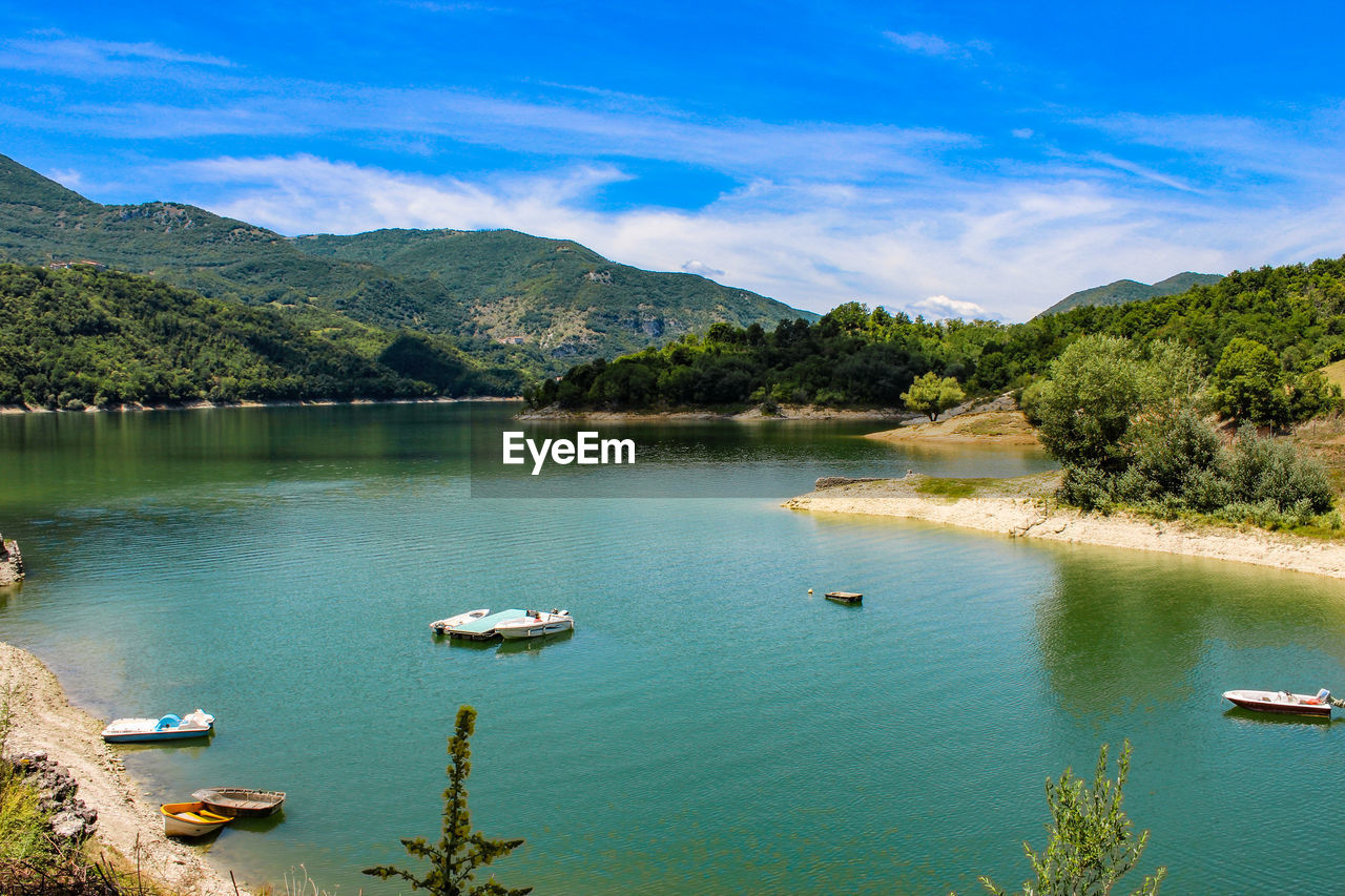 SCENIC VIEW OF BAY AGAINST SKY