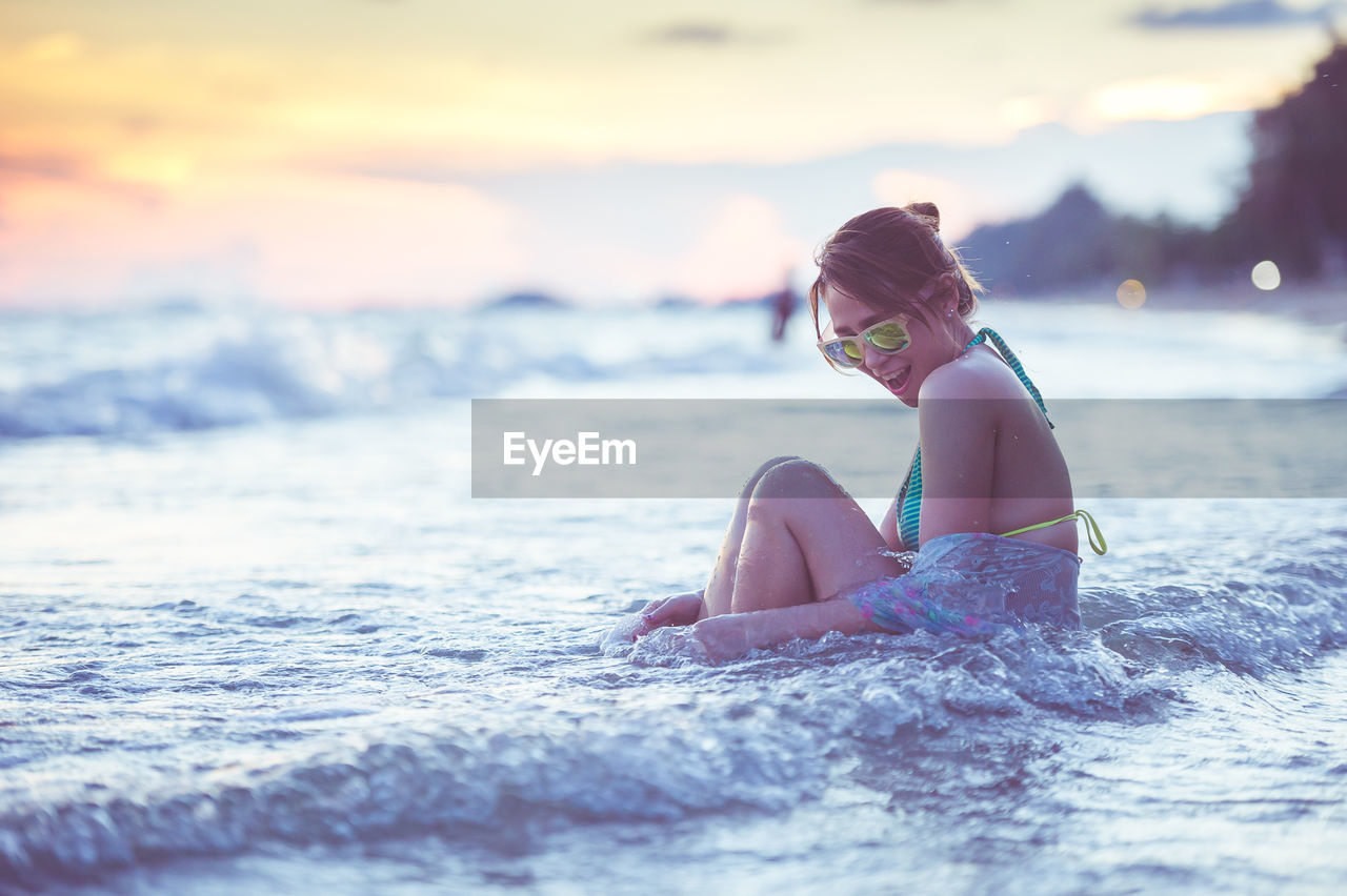 Woman enjoying in sea