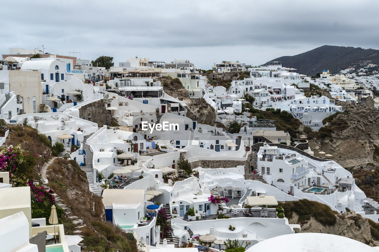 High angle view of buildings in city against sky