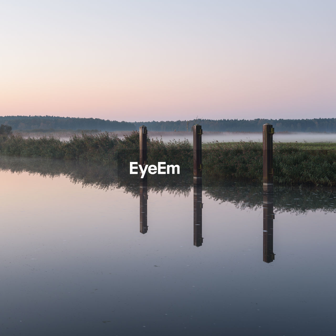 Scenic view of lake against clear sky