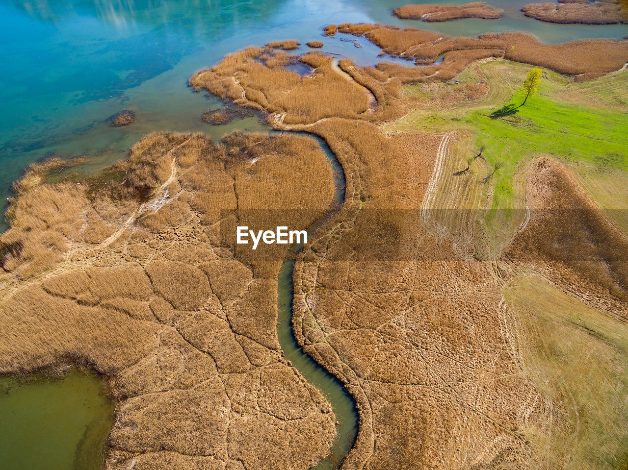 HIGH ANGLE VIEW OF LAND AND SEA