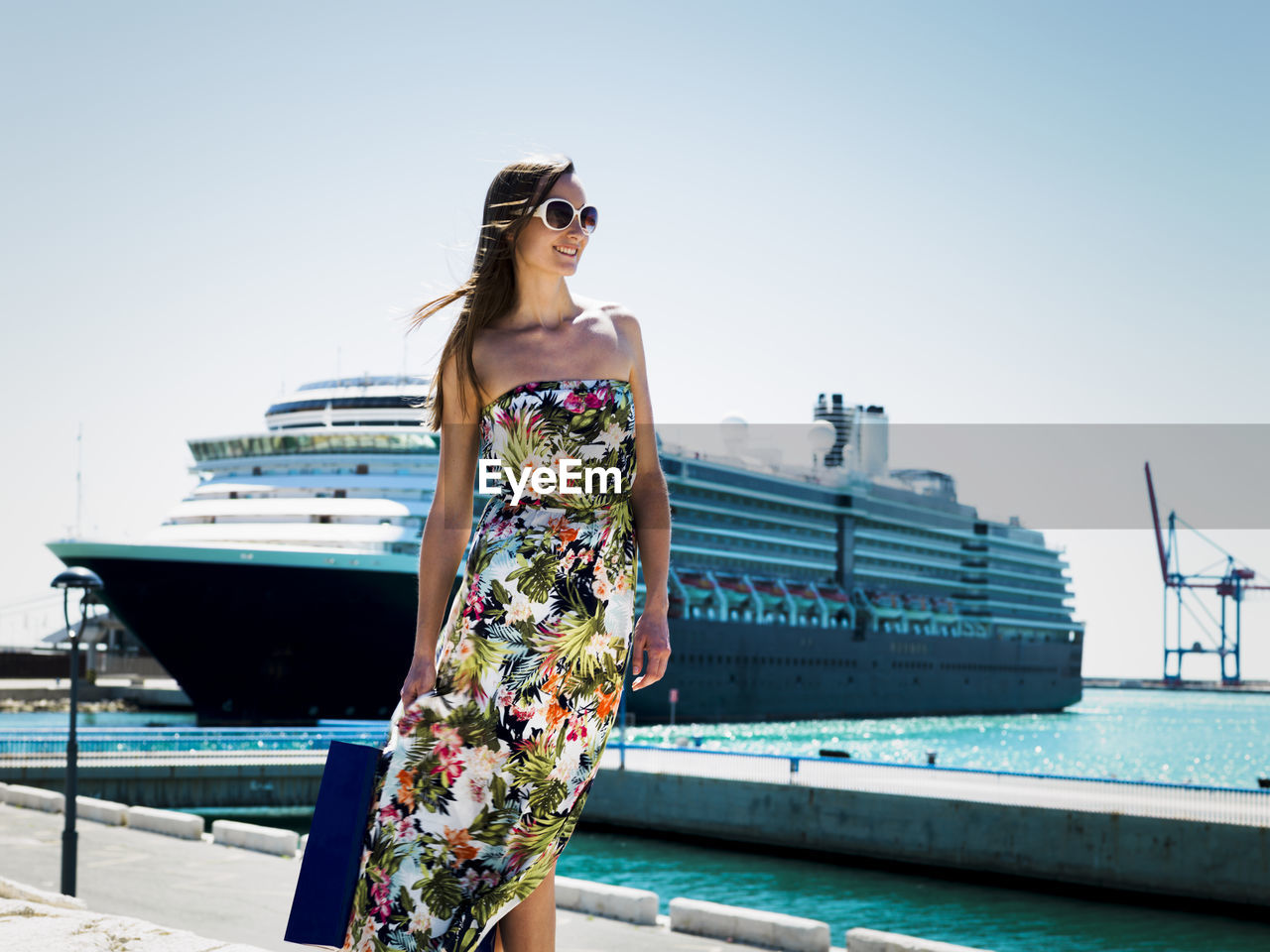 Woman in port of malaga, spain