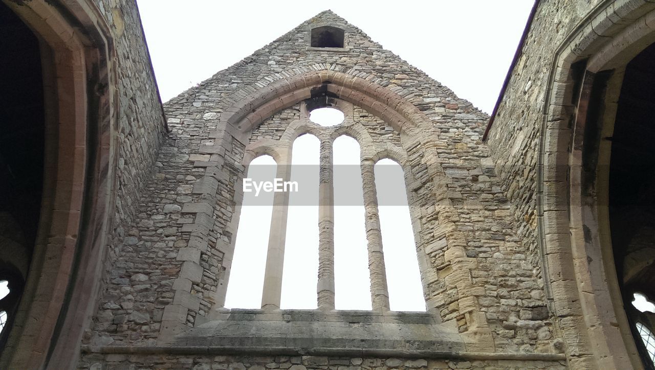 Low angle view of historic building against sky