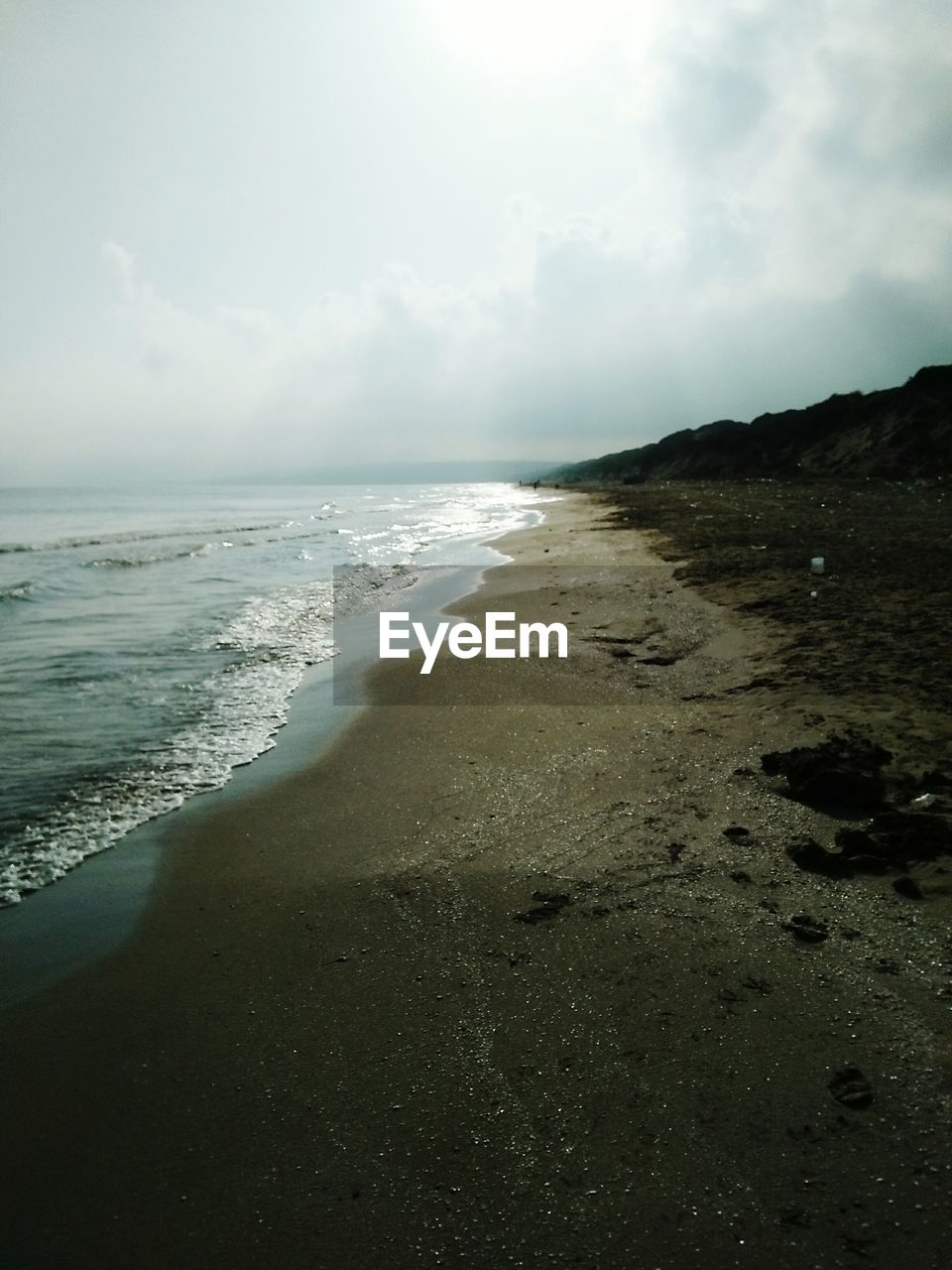 VIEW OF BEACH AGAINST SKY