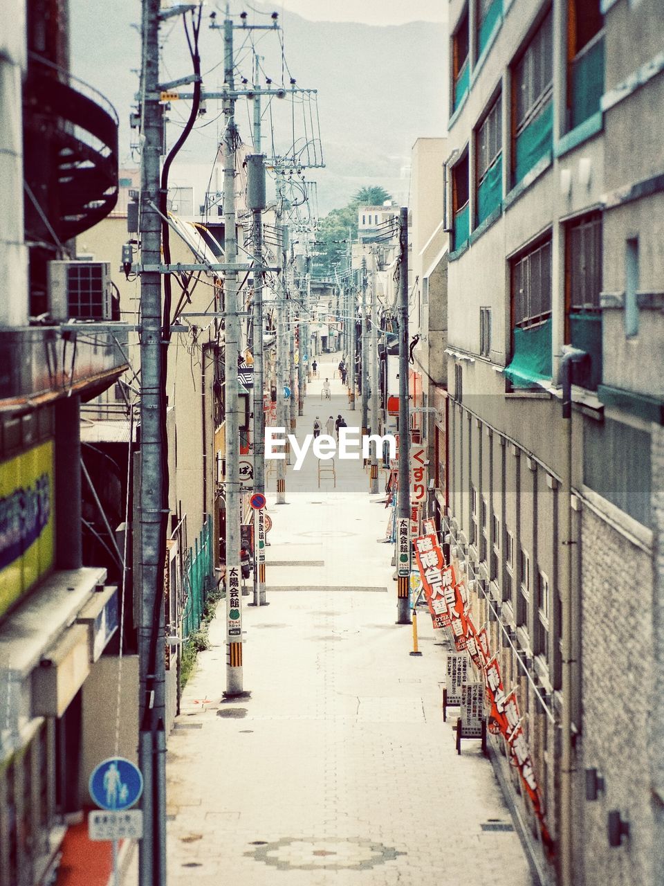 High angle view of street amidst buildings in city