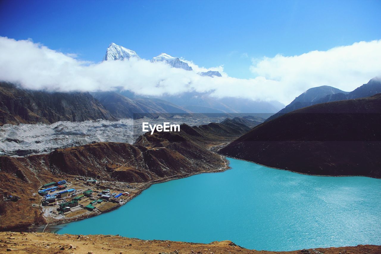 Scenic view of lake against blue sky