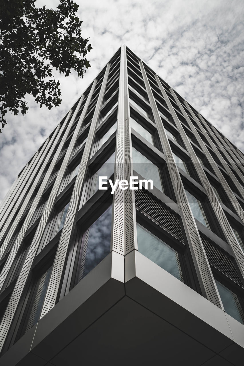 Low angle view of modern building against sky