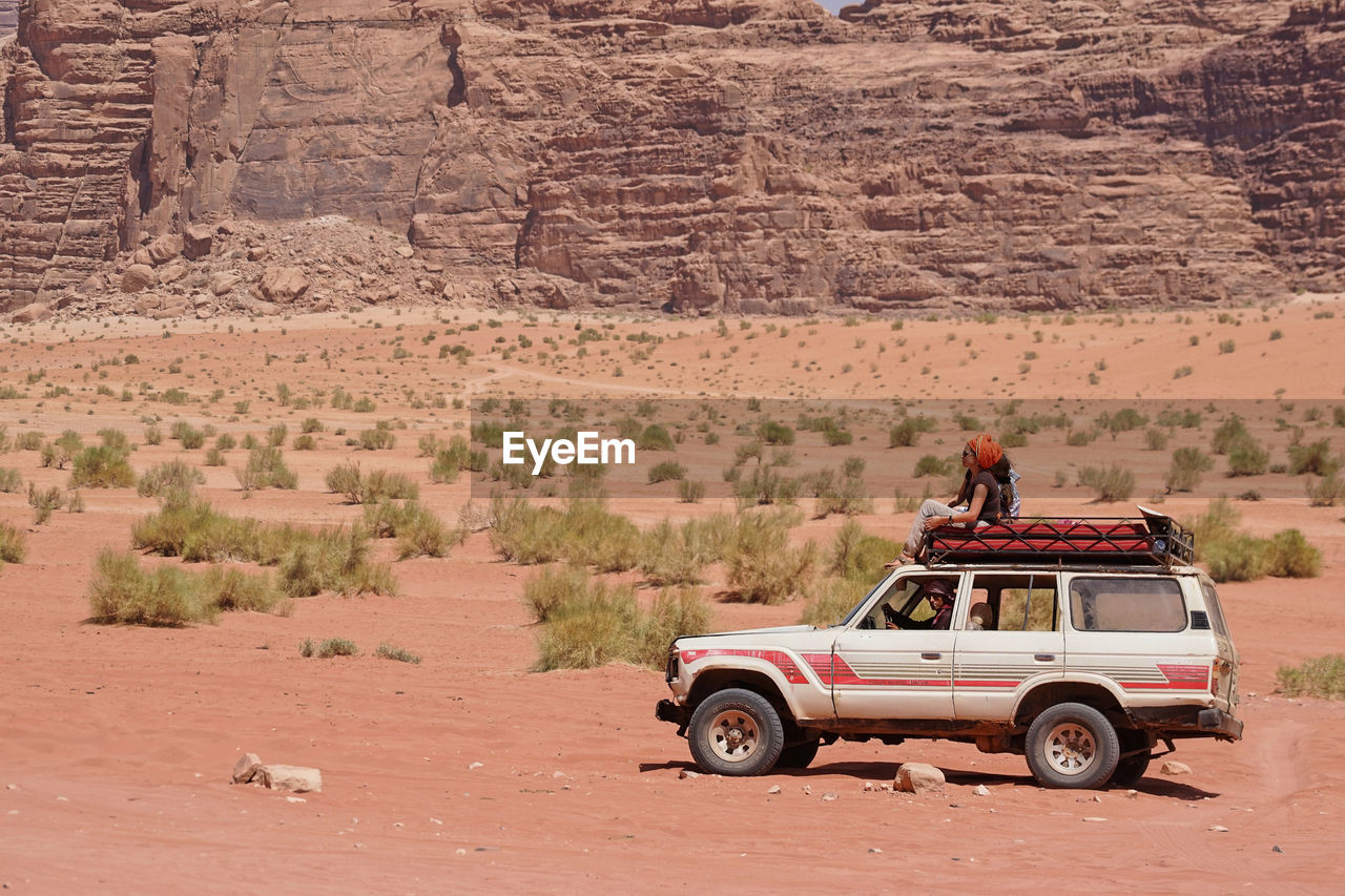 4x4 Wadi Rum Adult Adults Only Adventure Arid Climate Day Desert Driving Journey Land Vehicle Landscape Men Mode Of Transport Nature Off-road Vehicle Outdoors People Real People Road Scenics Togetherness Transportation Travel Travel Destinations