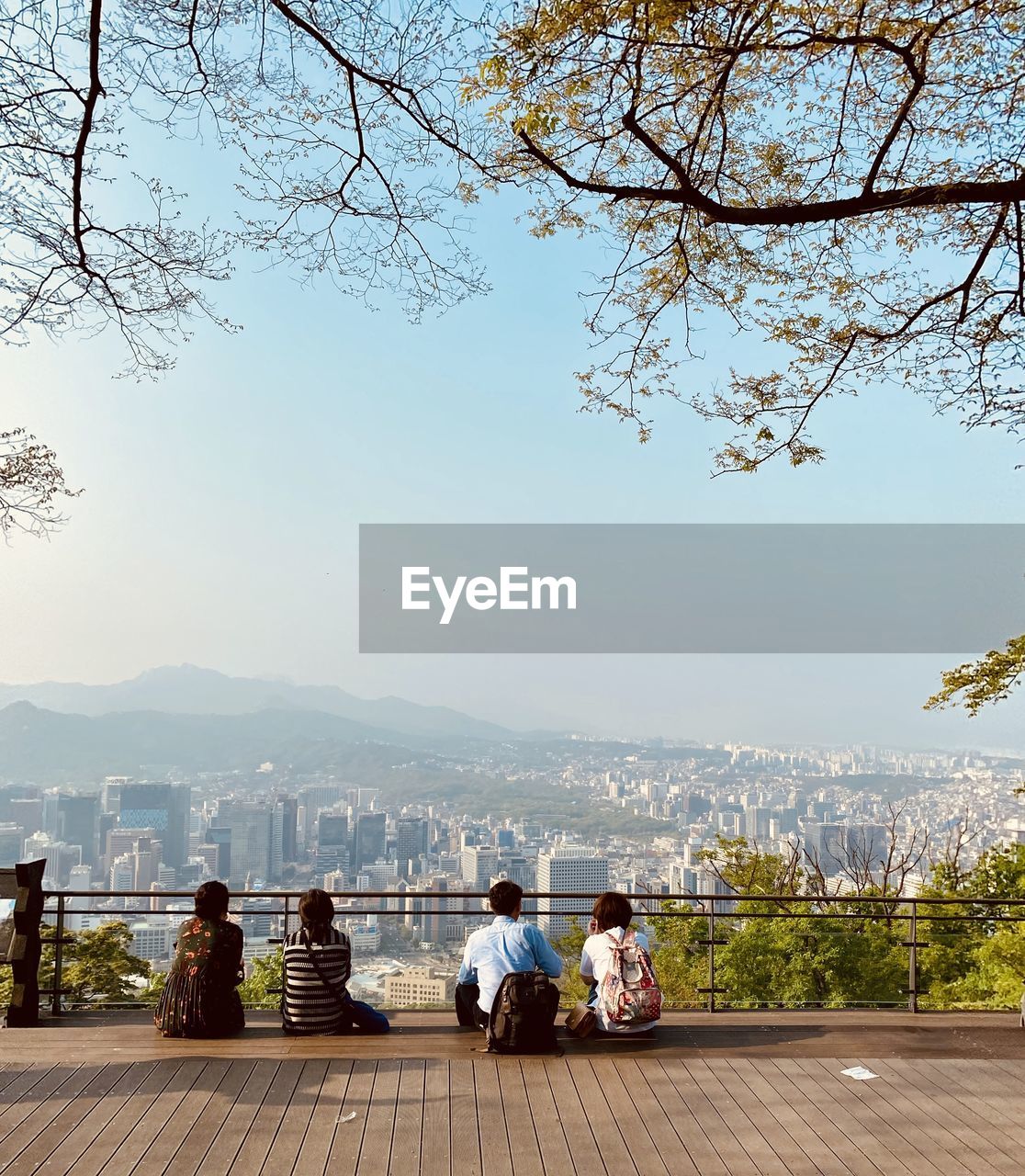 Rear view of people looking at view namsan park 