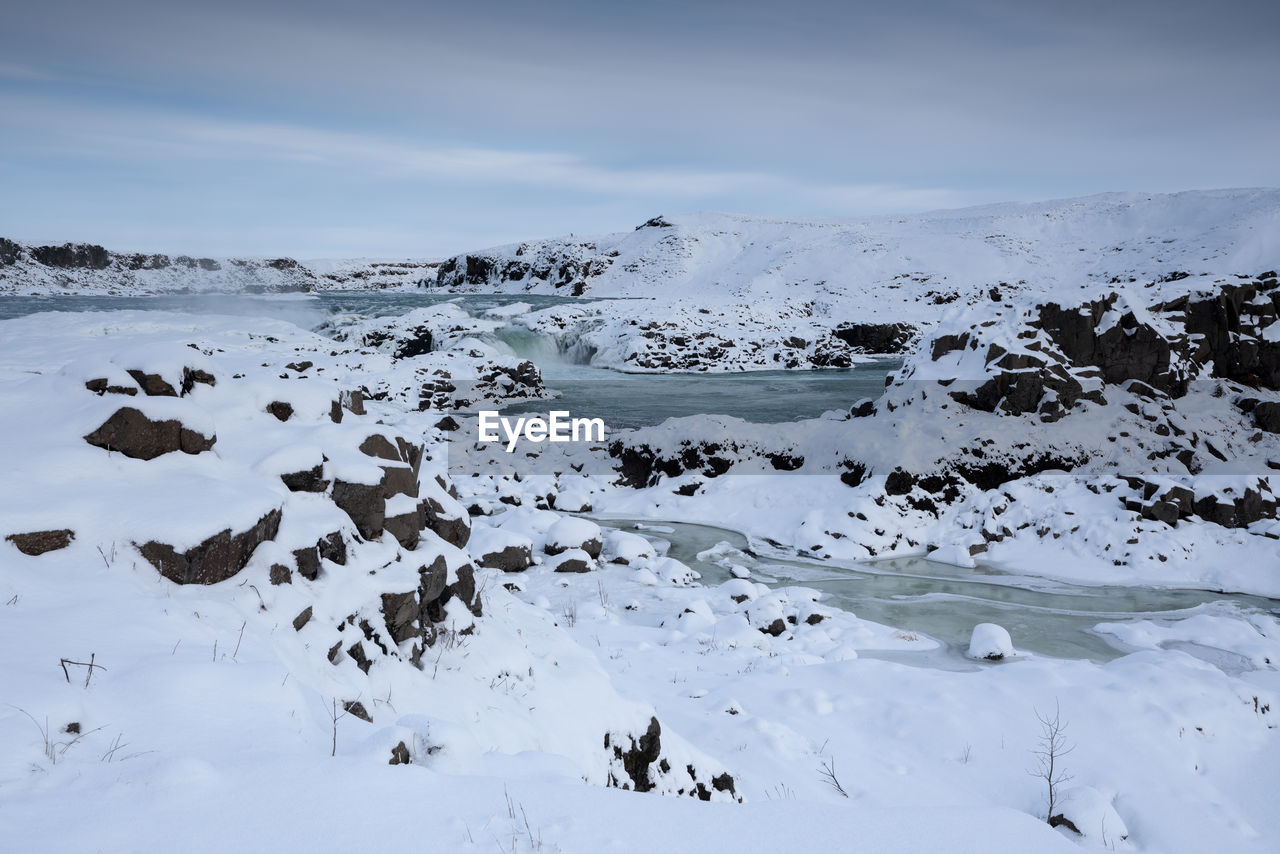 Panoramic image of the frozen waterfall urridafoss, iceland, europe