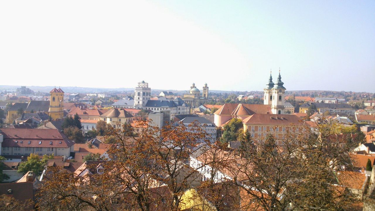 Scenic view of residential district against sky