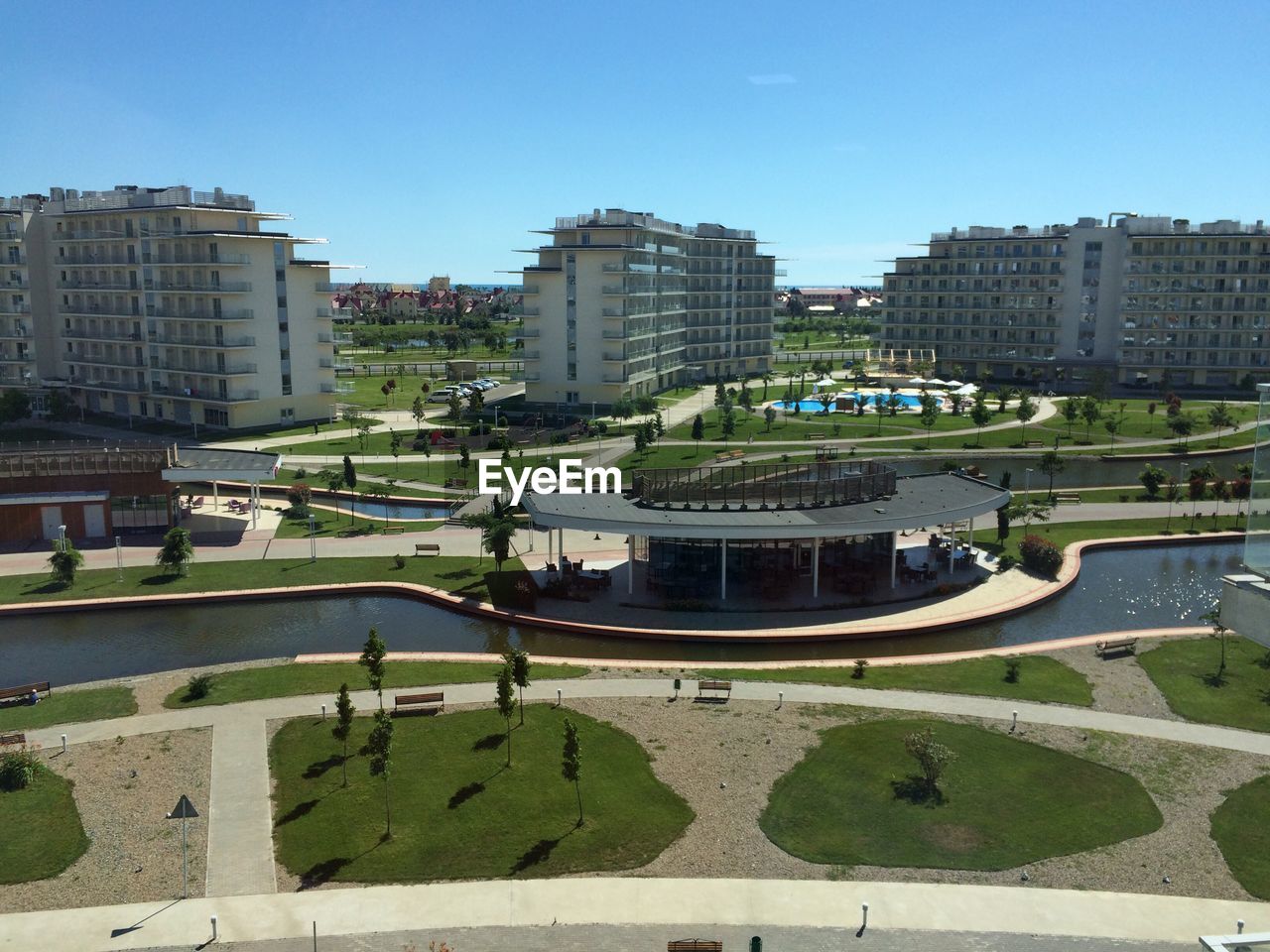 High angle view of canals by buildings in city