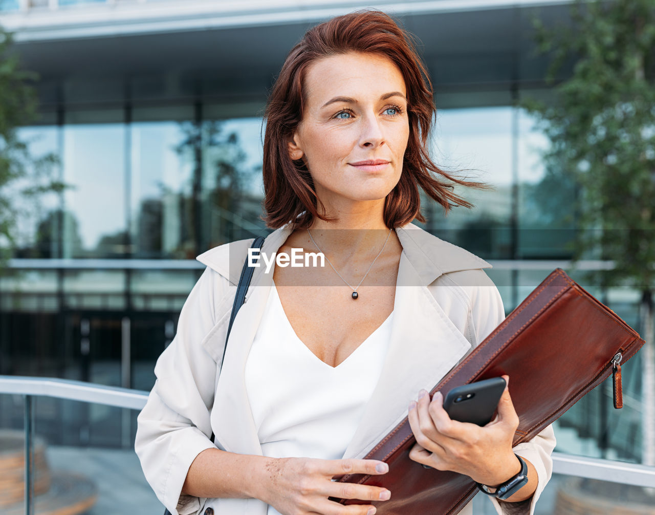 portrait of young woman using mobile phone