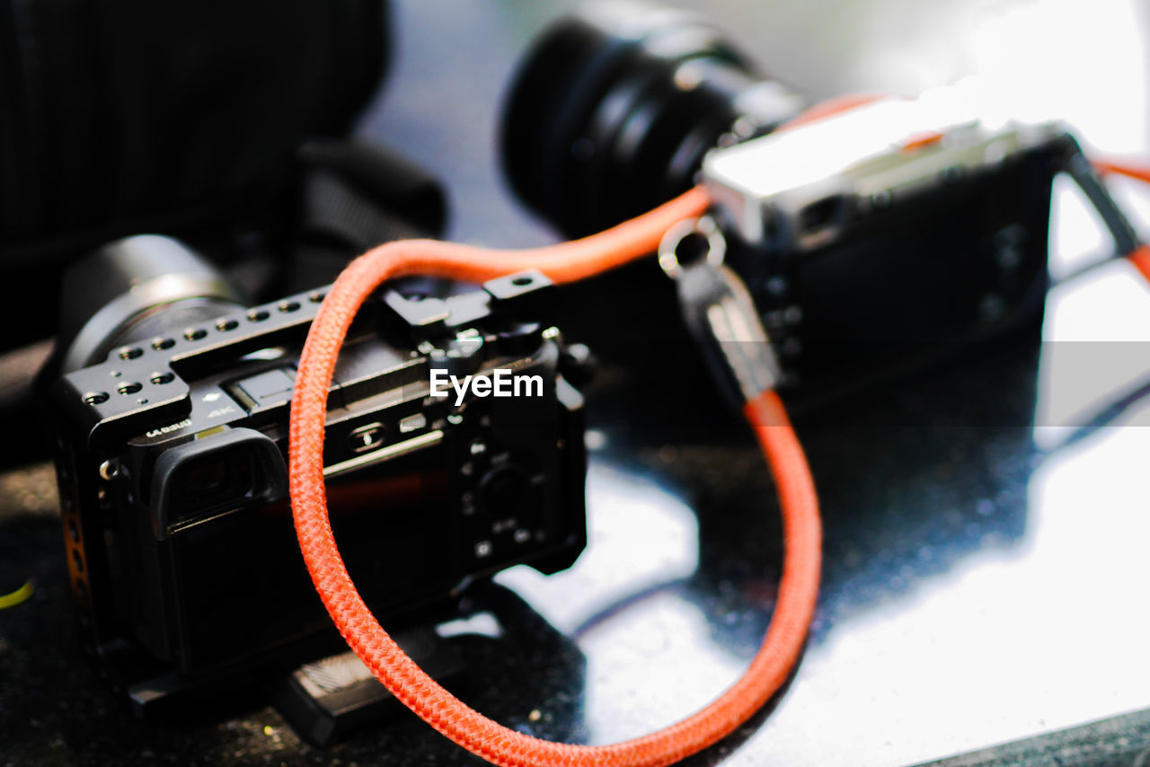 Close-up of camera on table