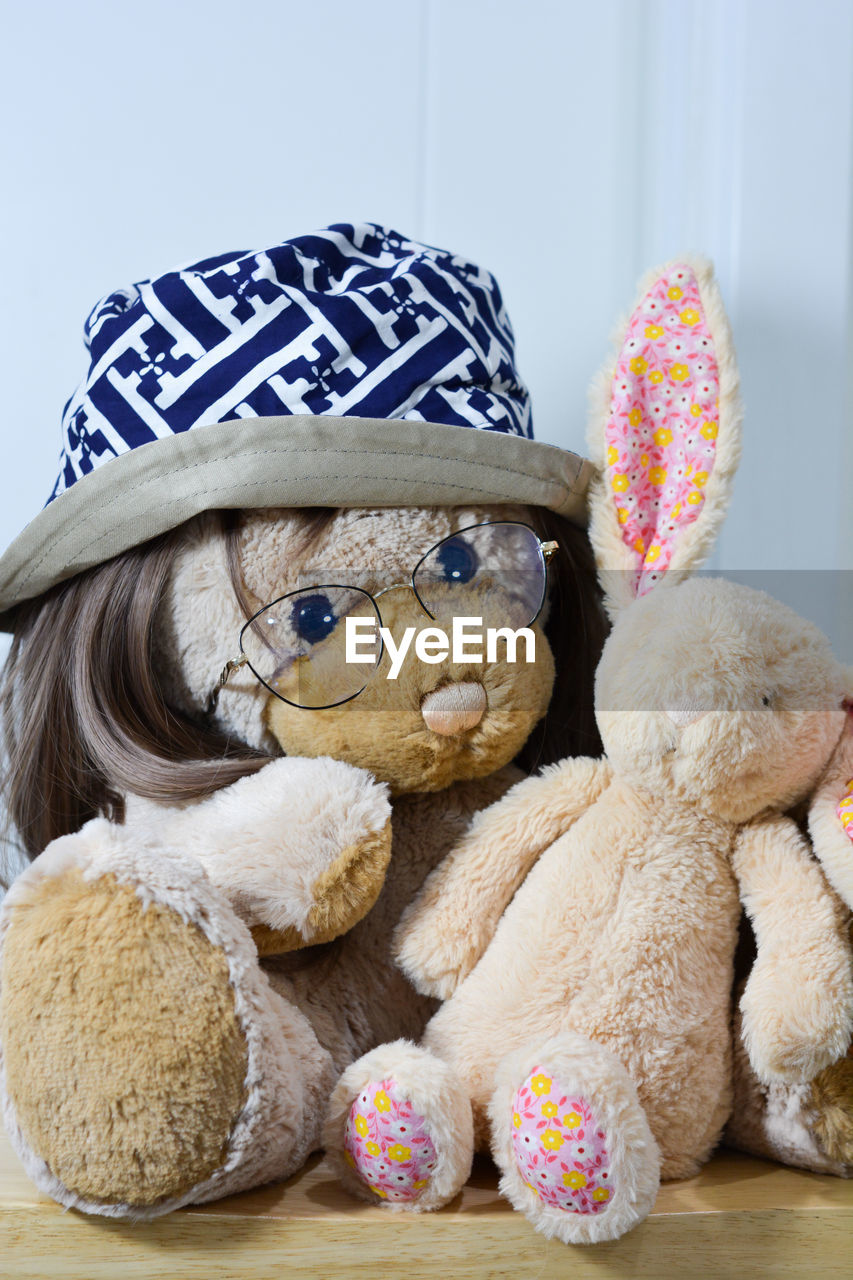 stuffed toy, toy, childhood, teddy bear, representation, indoors, plush, animal representation, child, cute, textile, hat, still life