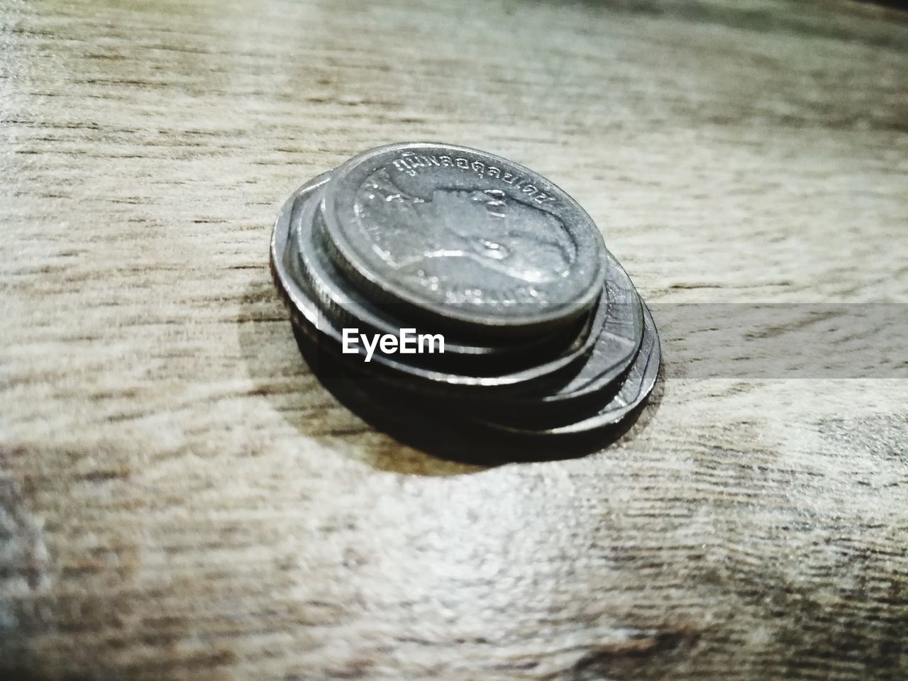 CLOSE-UP OF SUNGLASSES ON TABLE