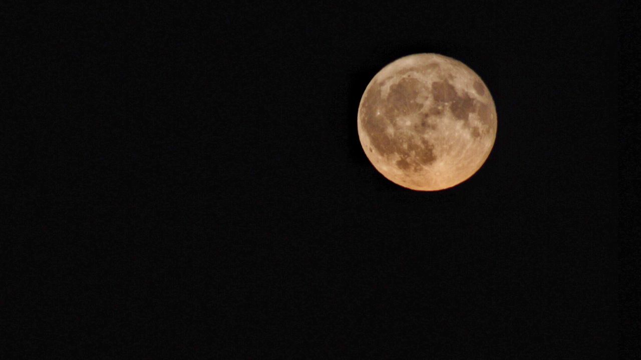 LOW ANGLE VIEW OF FULL MOON AGAINST SKY
