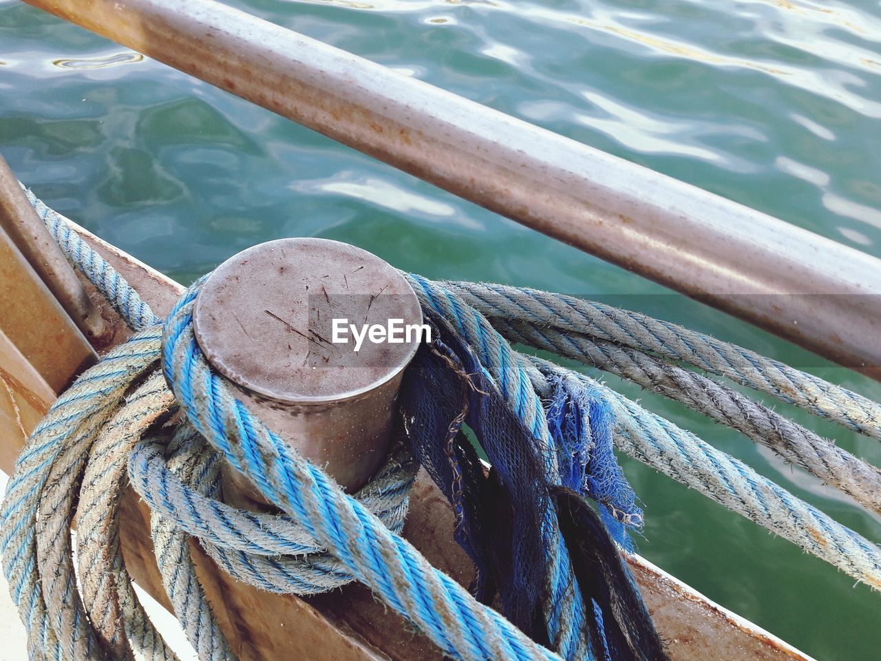 High angle view of rope tied on boat