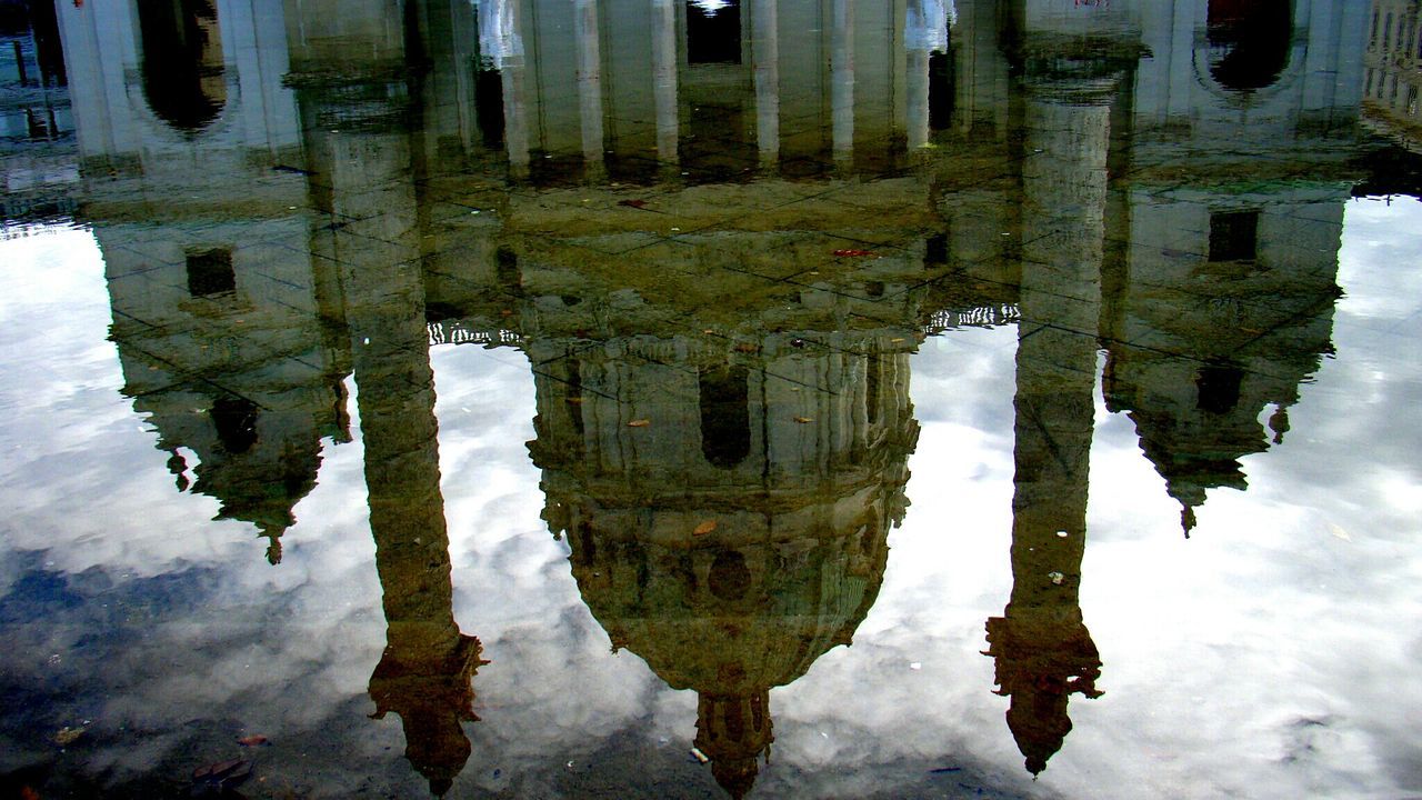 REFLECTION OF BUILT STRUCTURE ON WATER