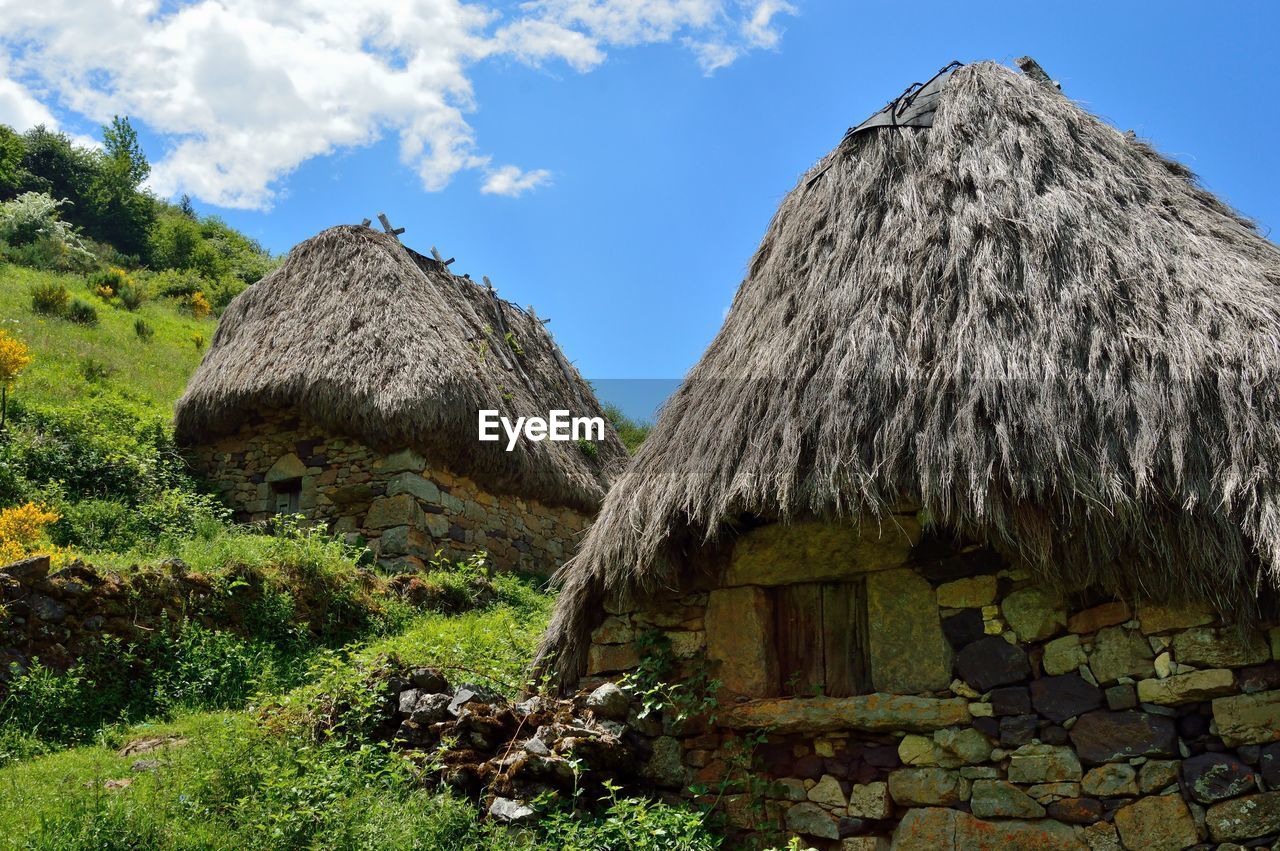 A traditional hute with thatched roof. braña la pornacal, somiedo, asturias, northern spain.