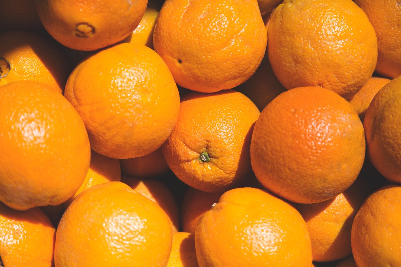 full frame shot of oranges at market