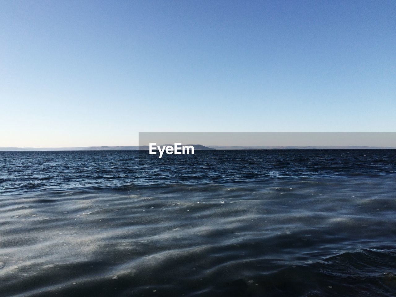 VIEW OF SEA AGAINST CLEAR SKY