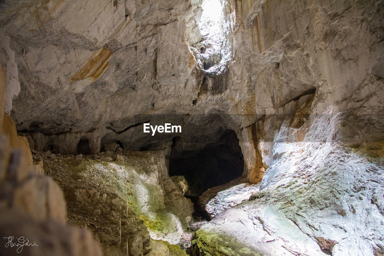 LOW ANGLE VIEW OF ROCK FORMATION