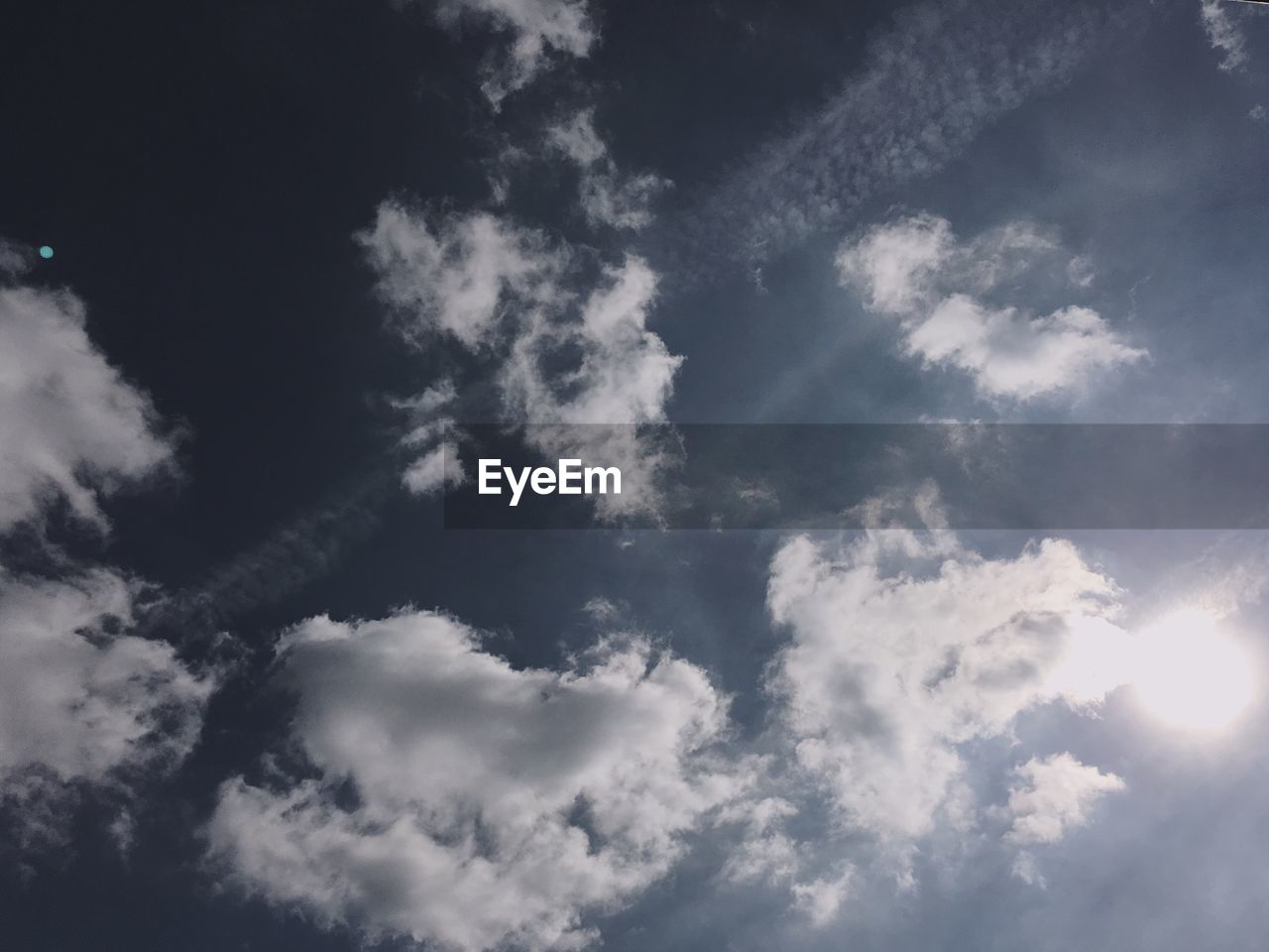 LOW ANGLE VIEW OF SKY AND CLOUDS