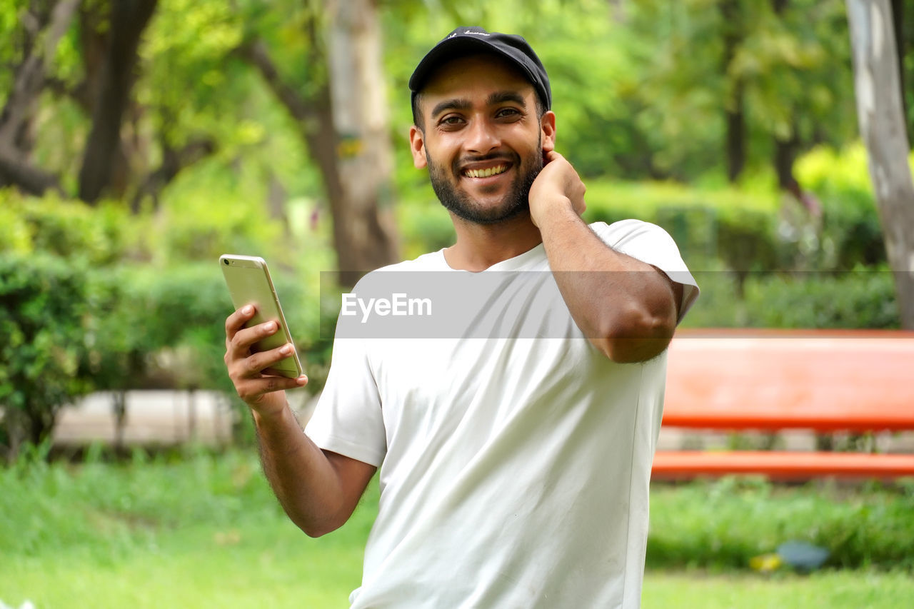 young man using mobile phone