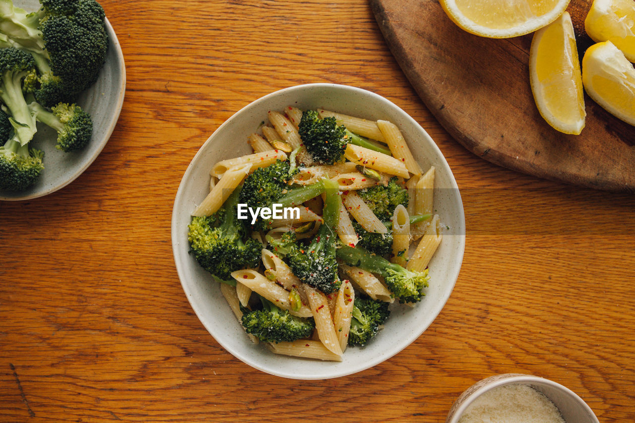 High angle view of pasta with broccoli in bowl on table, healthy eating, lunch.