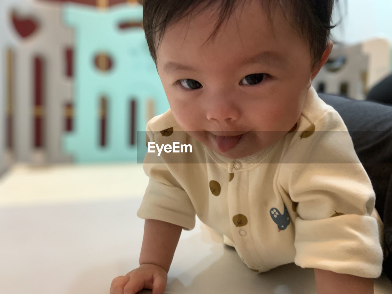 PORTRAIT OF CUTE BABY AT HOME