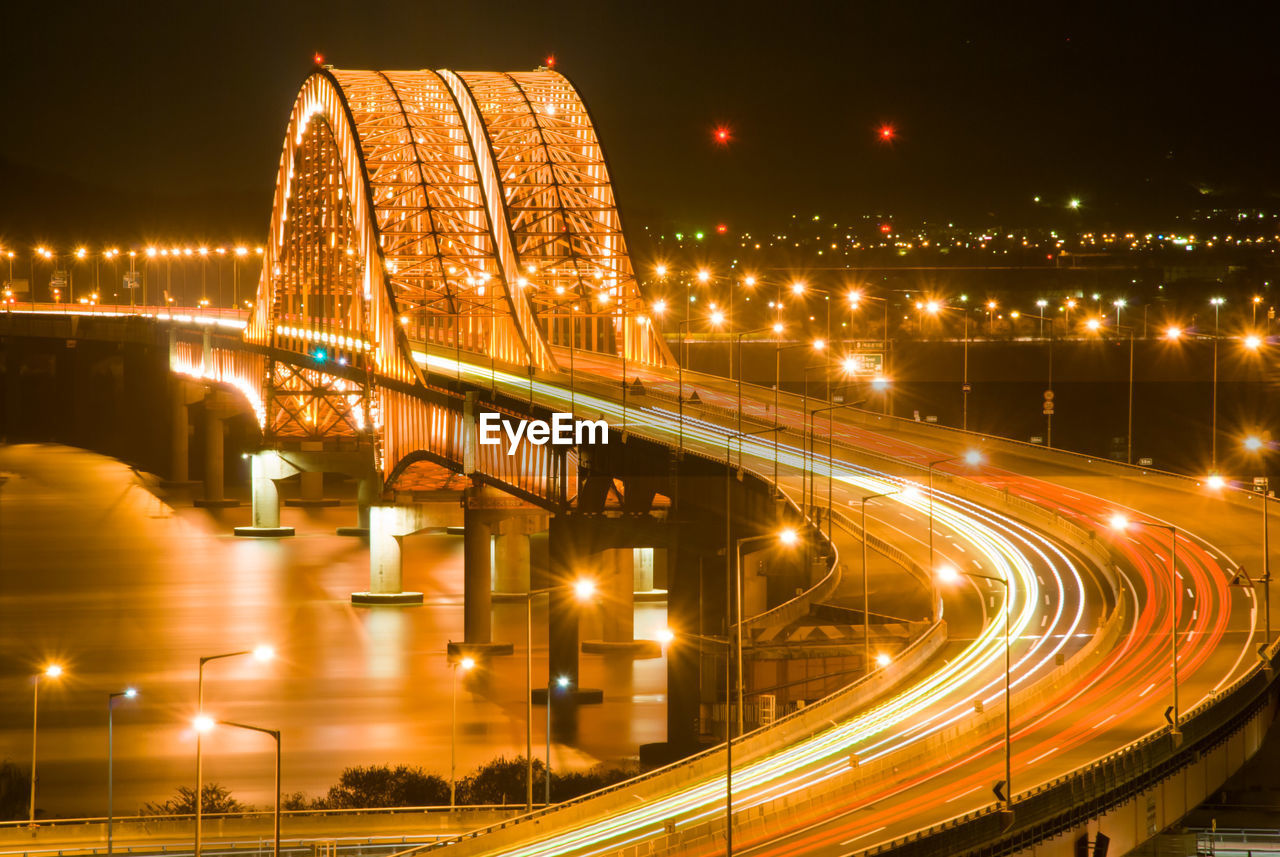 Illuminated suspension bridge at night