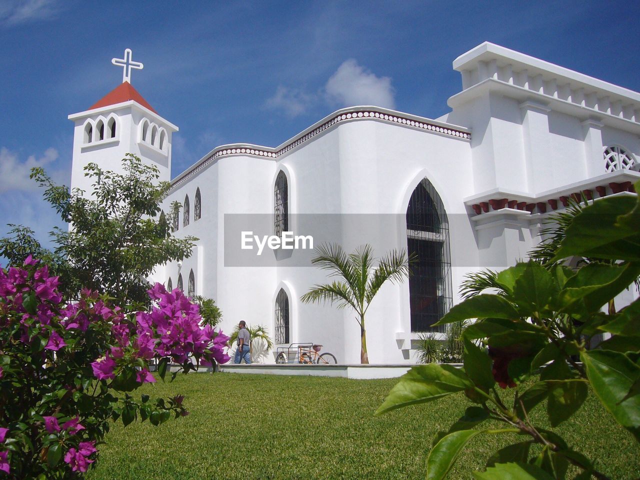 Facade of church viewed from lawn