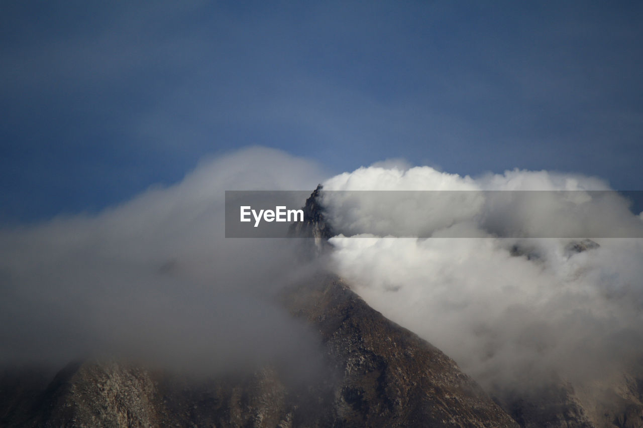 Low angle view of mountain against sky