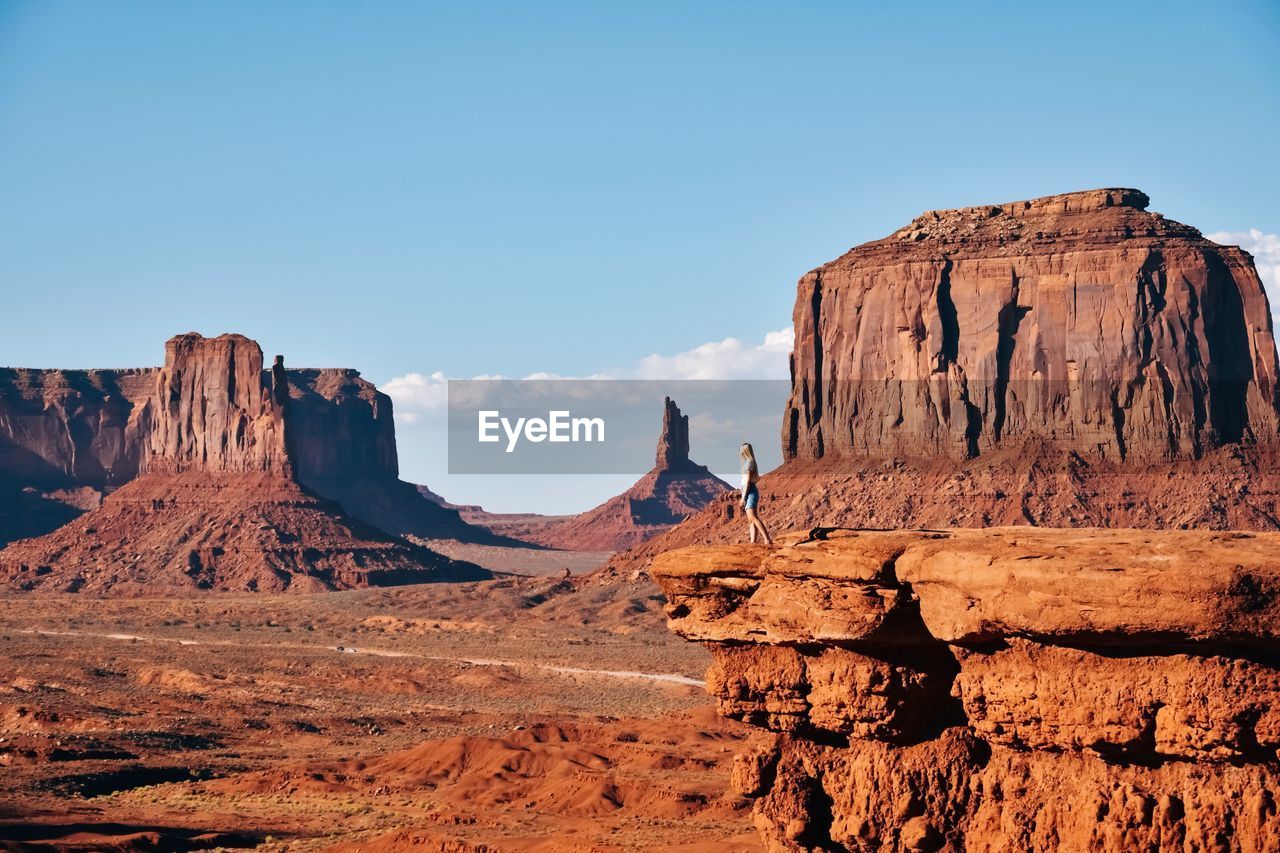 Rock formations on mountain against clear sky